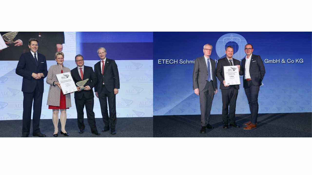 ETECH Schmid u. Pachler Elektrotechnik GmbH & Co KG gewinnt ALC-Award: Zwei Gruppen präsentieren Auszeichnungen auf der Bühne.